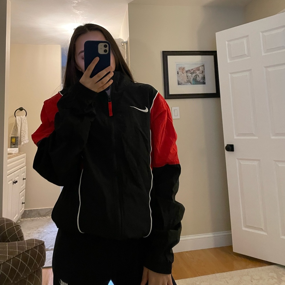 Nike re and black windbreaker